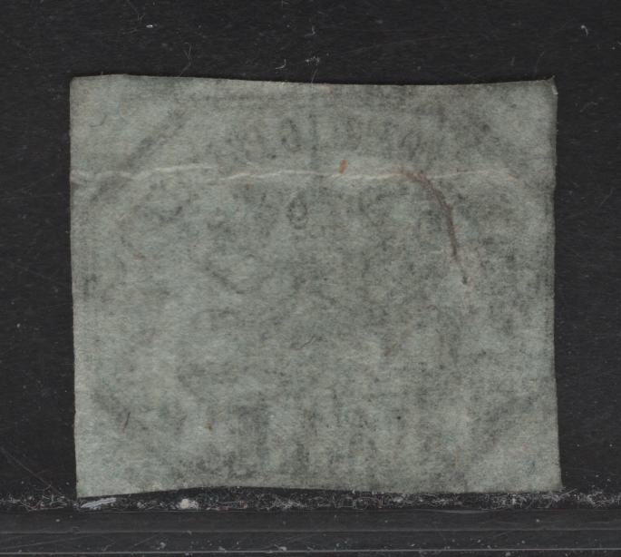 Lot 60 Roman States SC#7 6b Black on Greenish Gray Papal Arms, 1852 Imperf Arms Issue, A Very Good Unused Imperf Single, Just Touching On 2Sides, Light Horizontal Crease At Top, Posesses All 13 Characteristics of The Genuine Stamp.