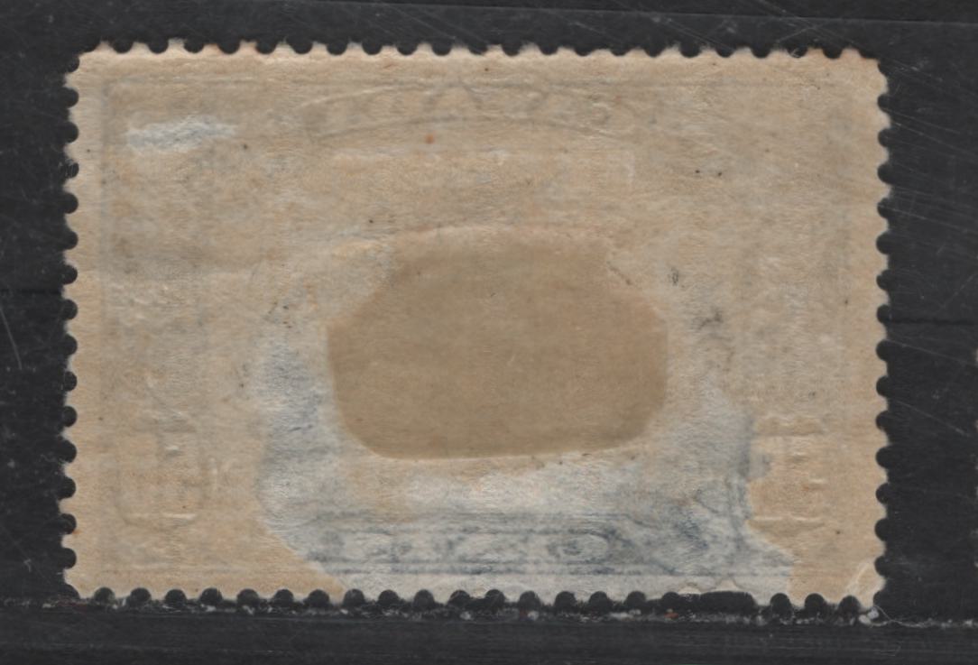 Lot 282 Canada #158 50c Dark Bright Blue Bluenose, 1928-1929 Scroll Issue, A Fair OG Single, Paper ABN-Q, Well Centered Spacefiller, Very Severe Thin That Has Caused The Bottom Perfs to Bend, Two Toned Perfs At Top.