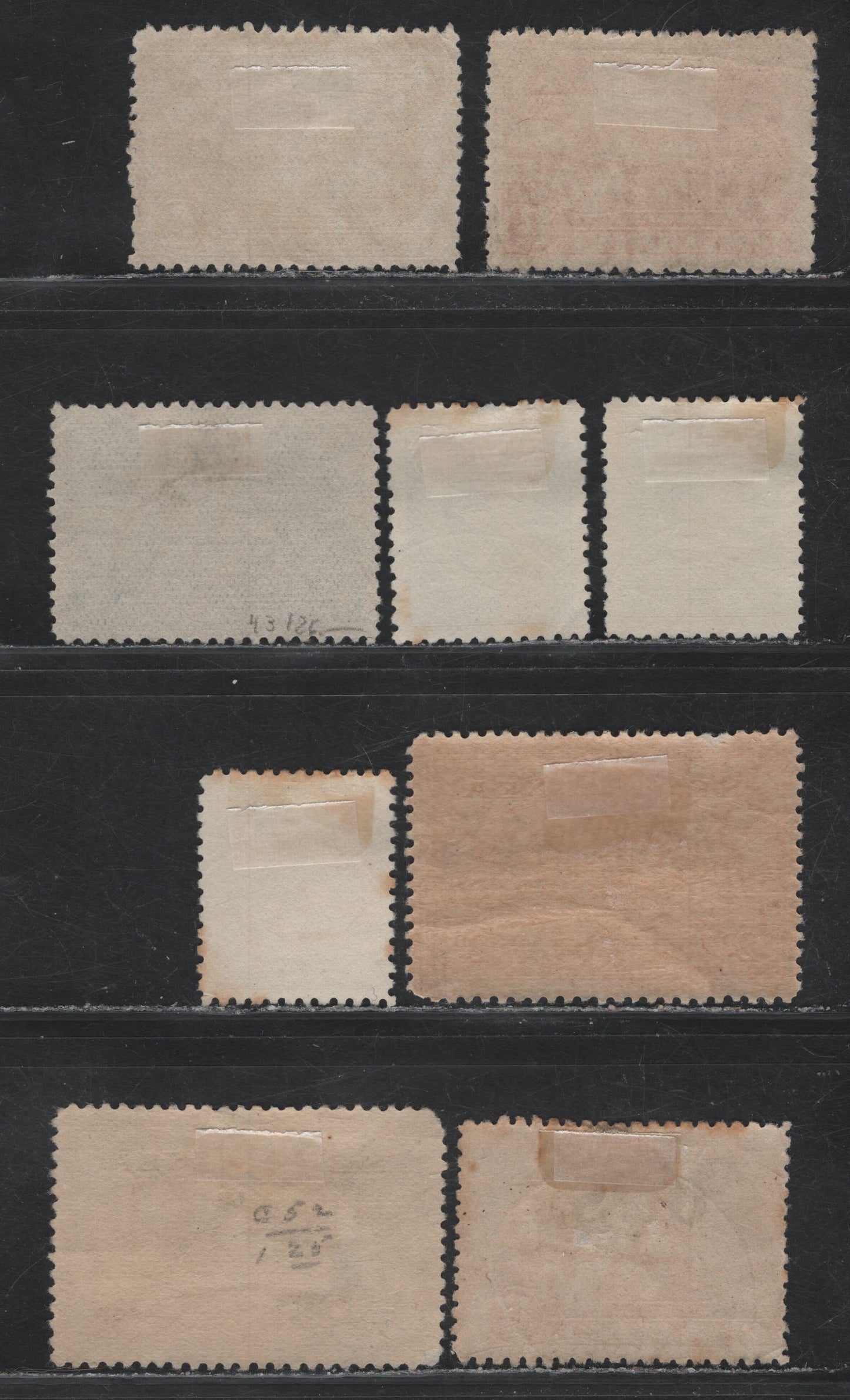 Lot 62 New Guinea (C) SG#126-a, 128, 209-211, 215, 218, O24 1d - 2d Green - Claret Native Village - Bulolo Goldfields, 1925-1939 Native Village - Airmail Issues, 9 Fine/Very Fine Used Singles