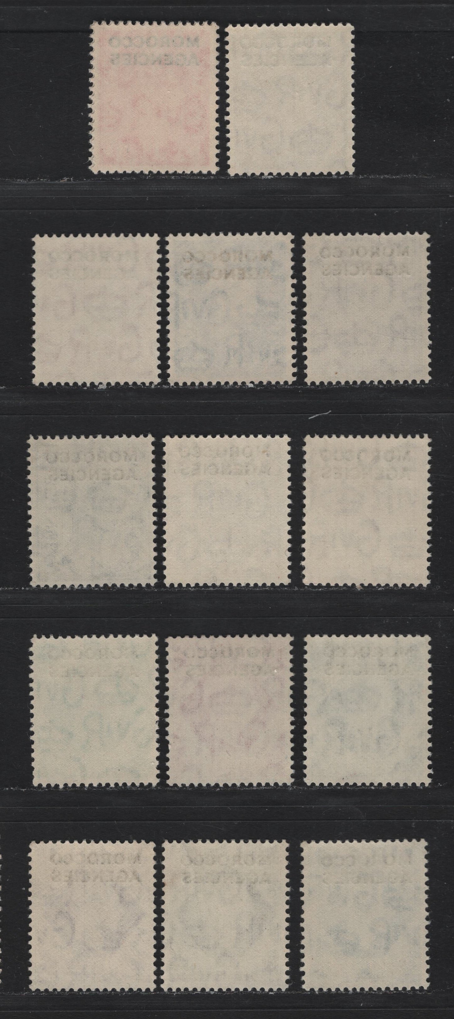 Lot 208 Morocco Agencies - British Currency SG#77, 79-81 1/2d - 1/- Pale Green - Bistre Brown , 1949 KGVI Issue, 14 F/VFNH Singles, Mostly VF, Missing Only The 1d