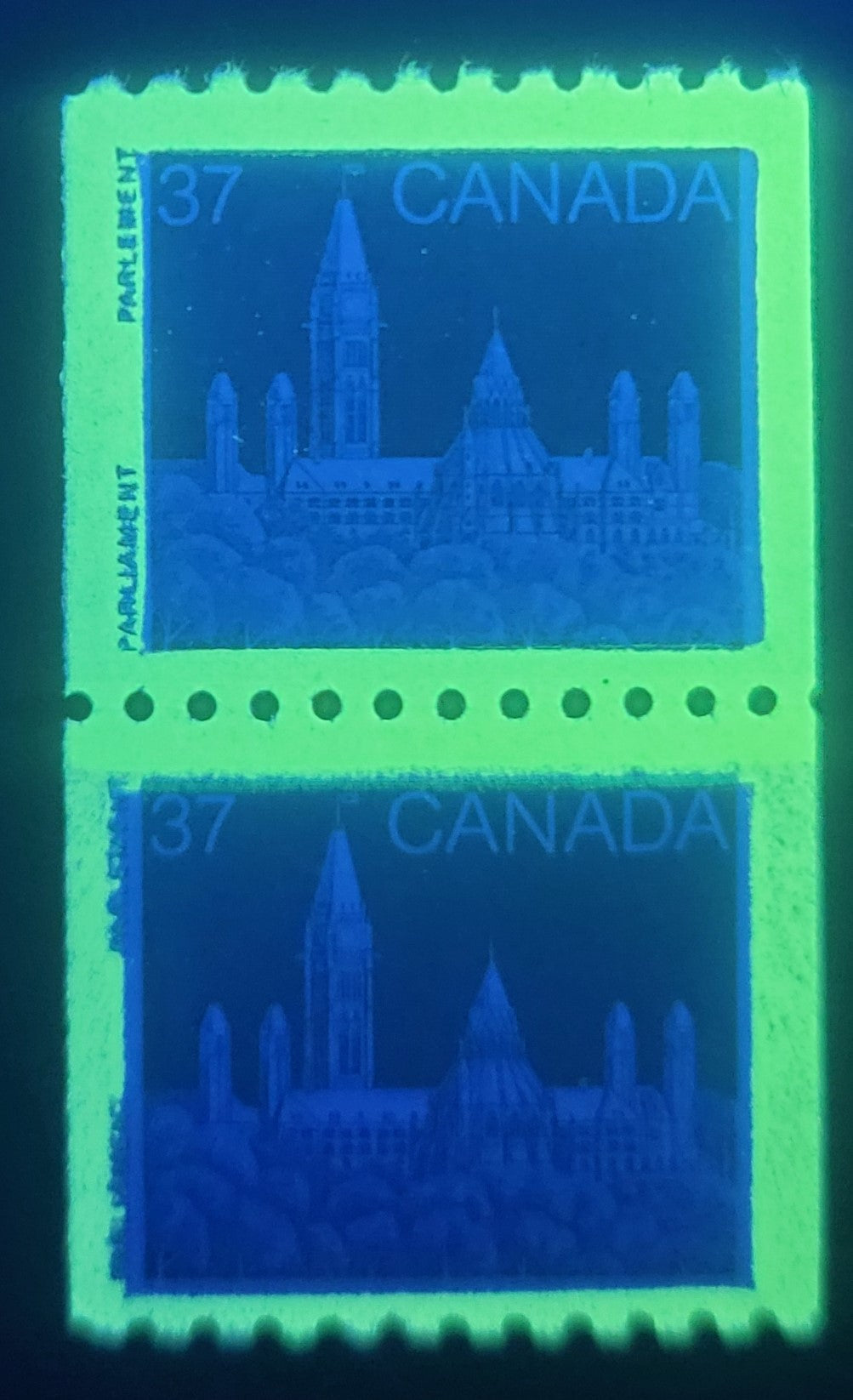 Lot 73 Canada #1194i 37c Blue Parliament Buildings, 1988-1991 Mammal & Architecture Issue, A VFNH Coil Pair ON DF Rolland Paper, Showing Horizontal Tagging Shift In Which Taggant Appears Between Inscriptions