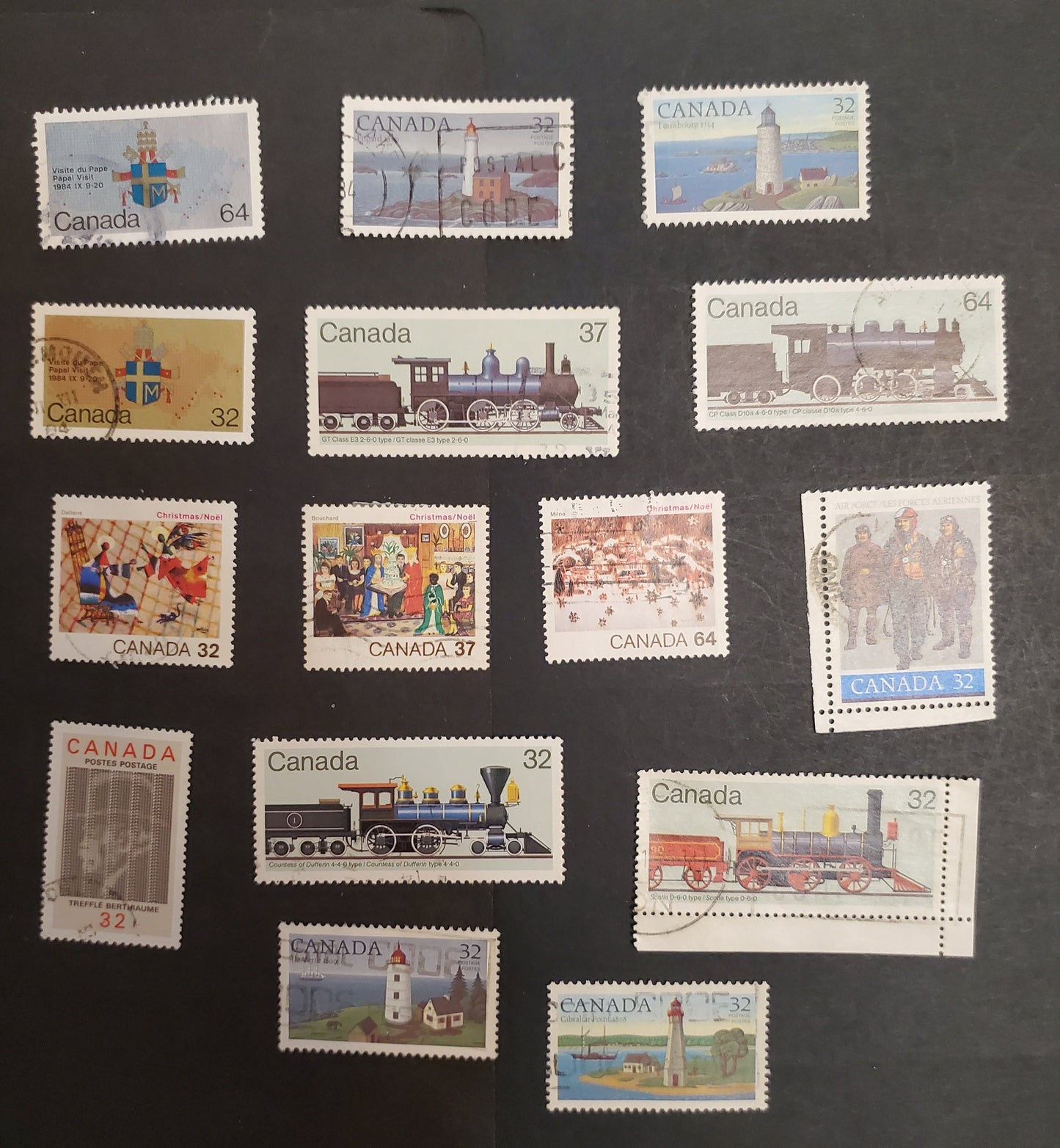 Lot 21 Canada 1030-1044 32c, 37c, 64c Multicoloured Various Subjects, 1984 Papal Visit - Christmas Issues, 15 VF Used Singles Most All With Light, In-Period Cancels