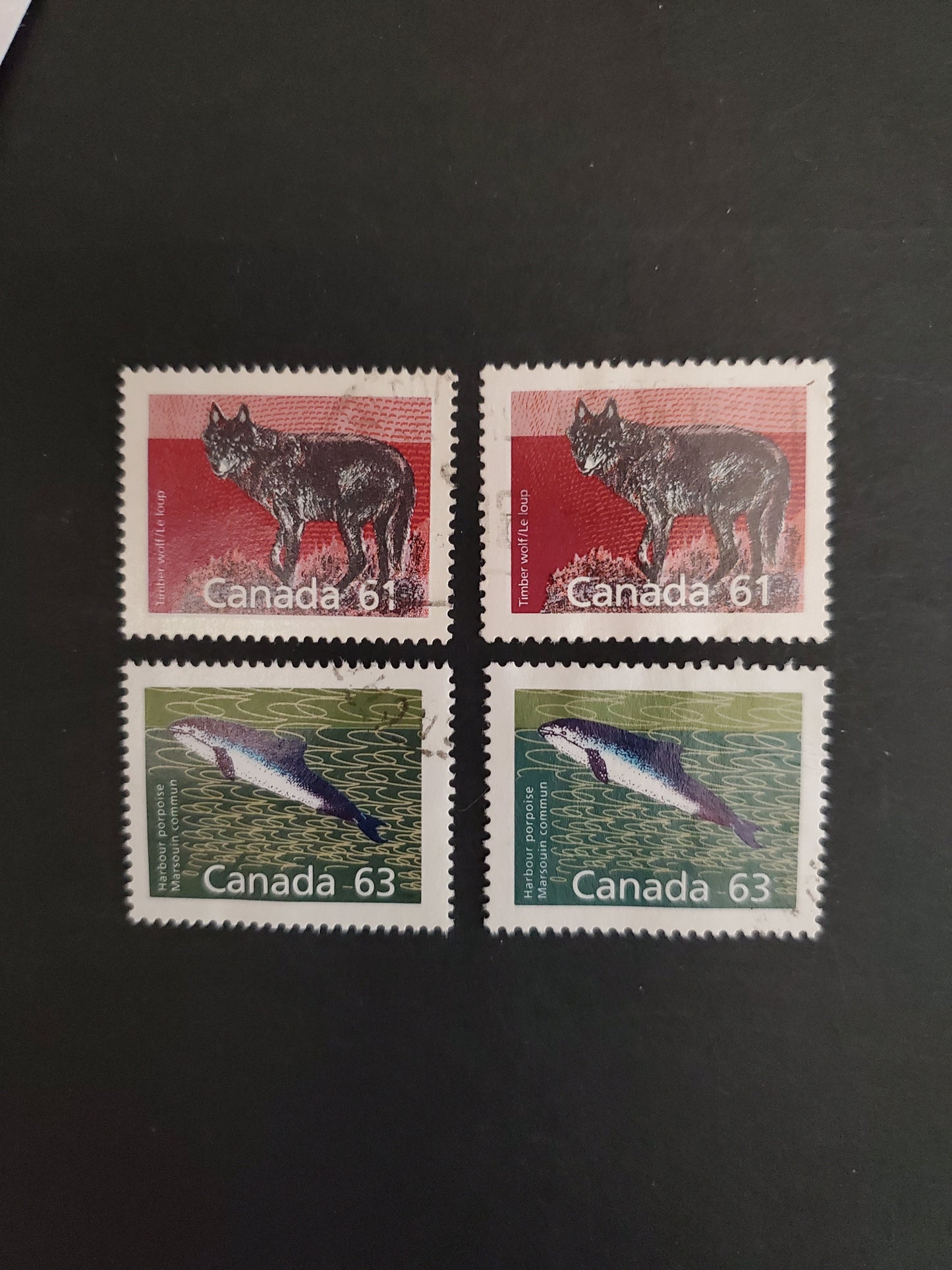 Canada #1175, 1175a, 1176, 1176a 61c & 63c Multicoloured Timber Wolf & Harbour Porpoise, 1987-1991 Mammal & Architecture Issue, 4 VF Used Singles Both Perf. 14.4 x 13.8 and 13.1 Printings