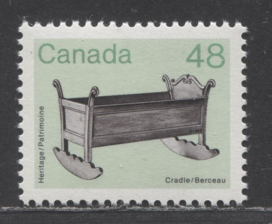 Lot 22 Canada #929 var 48c Multicoloured Cradle, 1982 - 1987 Medium - Value Artifact Definitives Issue, A VFNH Single With Green Background, Possible Trial Colour