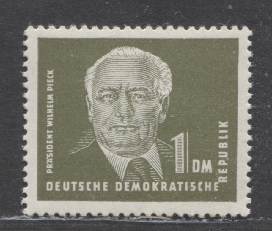 Lot 75 German Democratic Republic Mi#325vxi (SC# 116) 1m Olive 1952-1953 Pieck Definitives, Chalk Surfaced Paper, Type 1 Wmk, A VFNH Single, Click on Listing to See ALL Pictures, Estimated Value $30