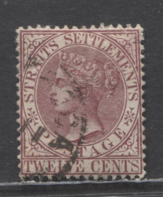 Lot 90 Straits Settlements SC#90 12c Claret 1882-1899 Queen Victoria Issue, Printing With Broken 'E' In 'Twelve', Unlisted In Gibbons, A Very Fine Used Single, Click on Listing to See ALL Pictures, Estimated Value $100
