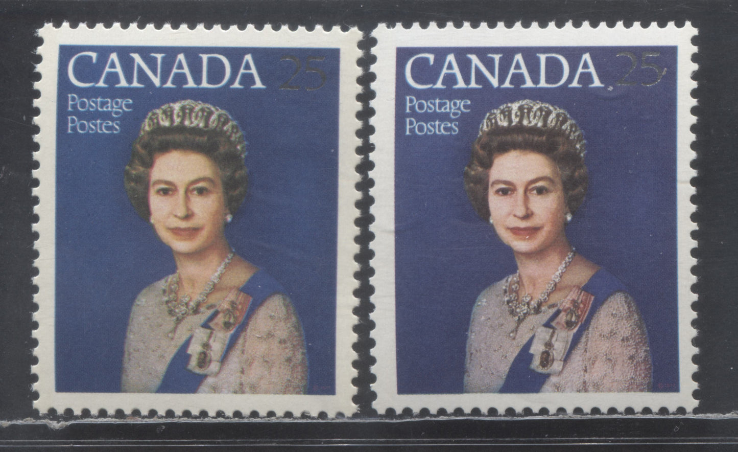 Lot 446 Canada #704var 25c Silver & Multicolored Queen Elizabeth II, 1977 Silver Jubilee Issue, 2 VFNH Singles With Violet Blue Shifted Very Slightly To The Right, Resulting In 'Blurry Appearance', Normal For Comparison