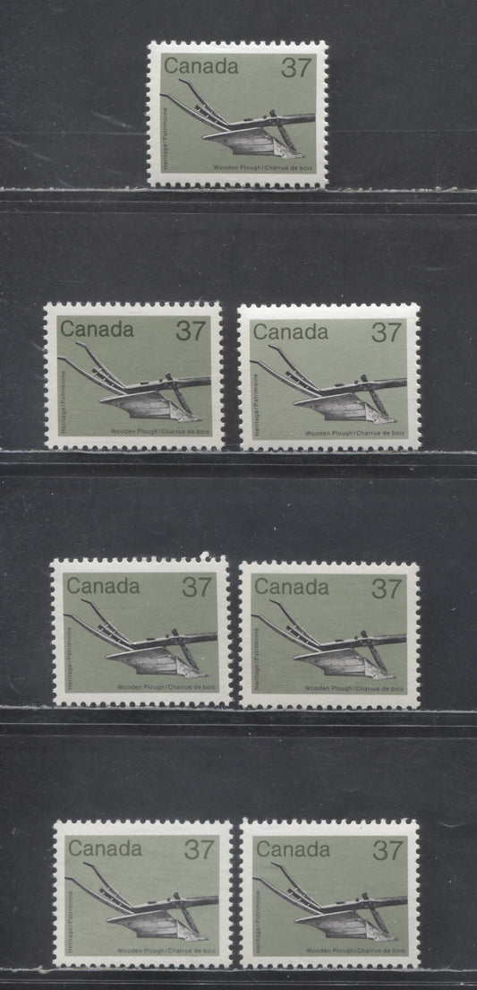 Lot 333 Canada #927,iii,v,i 37c Gray Green & Multicolored Wooden Plough, 1982-1987 Medium-Value Artifact Definitives, 7 VFNH Singles On NF/NF, NF/DF, DF/LF & LF/F Clark & Abitibi Papers