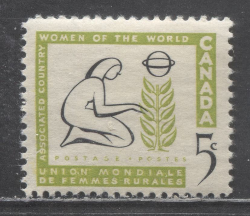 Lot 422 Canada #385 5c  Apple Green & Black Stylized Woman & Tree, 1959 Association of Country Women Issue, A VFNH Single, Smooth Paper, Slightly Streaky Deep Cream Gum Showing Frame Break Over First "S" of "Association"