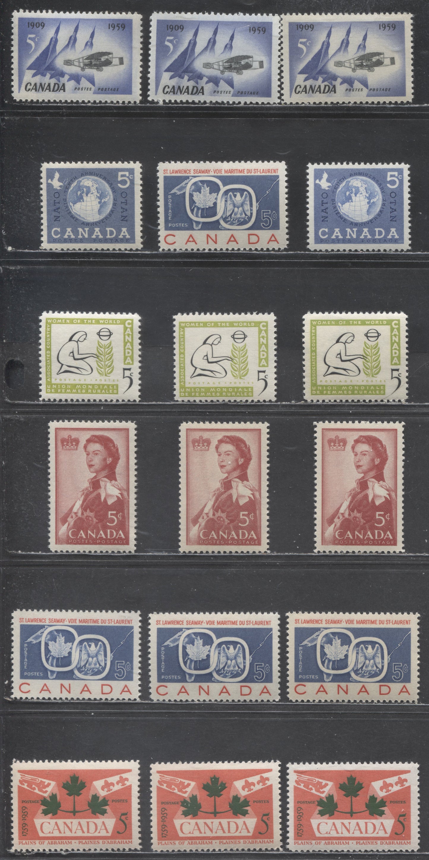 Canada #383-388 5c Various Colours Various Subjects, 1959 Silver Dart - Plains of Abraham Issues, 18 VFNH Singles,Smooth Paper, Ribbed On Back, Streaky And Smooth Cream  Semi-Gloss Gum Slightly Different Shades