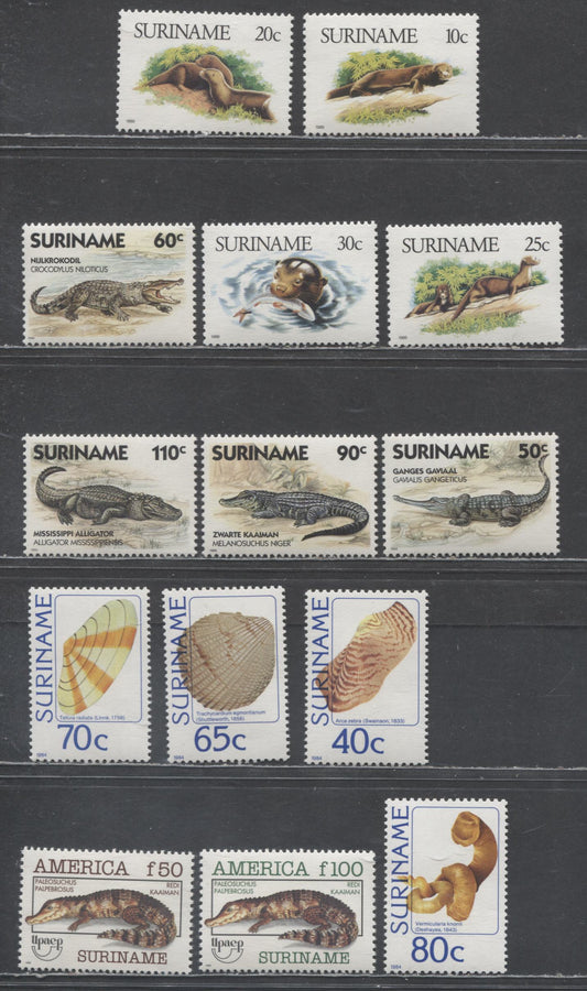 Lot 34 Suriname SC#669/958 1984-1993 Local Shells, Alligators-Crocodiles, Otters & America Issues, 14 VFNH Singles, Click on Listing to See ALL Pictures, 2017 Scott Cat. $25