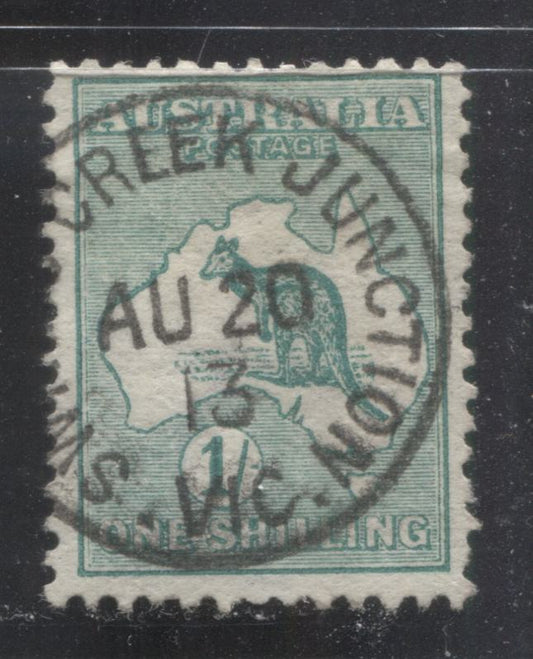 Lot 320 Australia SC#10a 1/- Emerald 1913 Kangaroo & Map Issue, First Wmk, With SON August 20, 1913 Swift Creek Junction CDS Cancel, A F/VF Used Single, Click on Listing to See ALL Pictures, Estimated Value $25