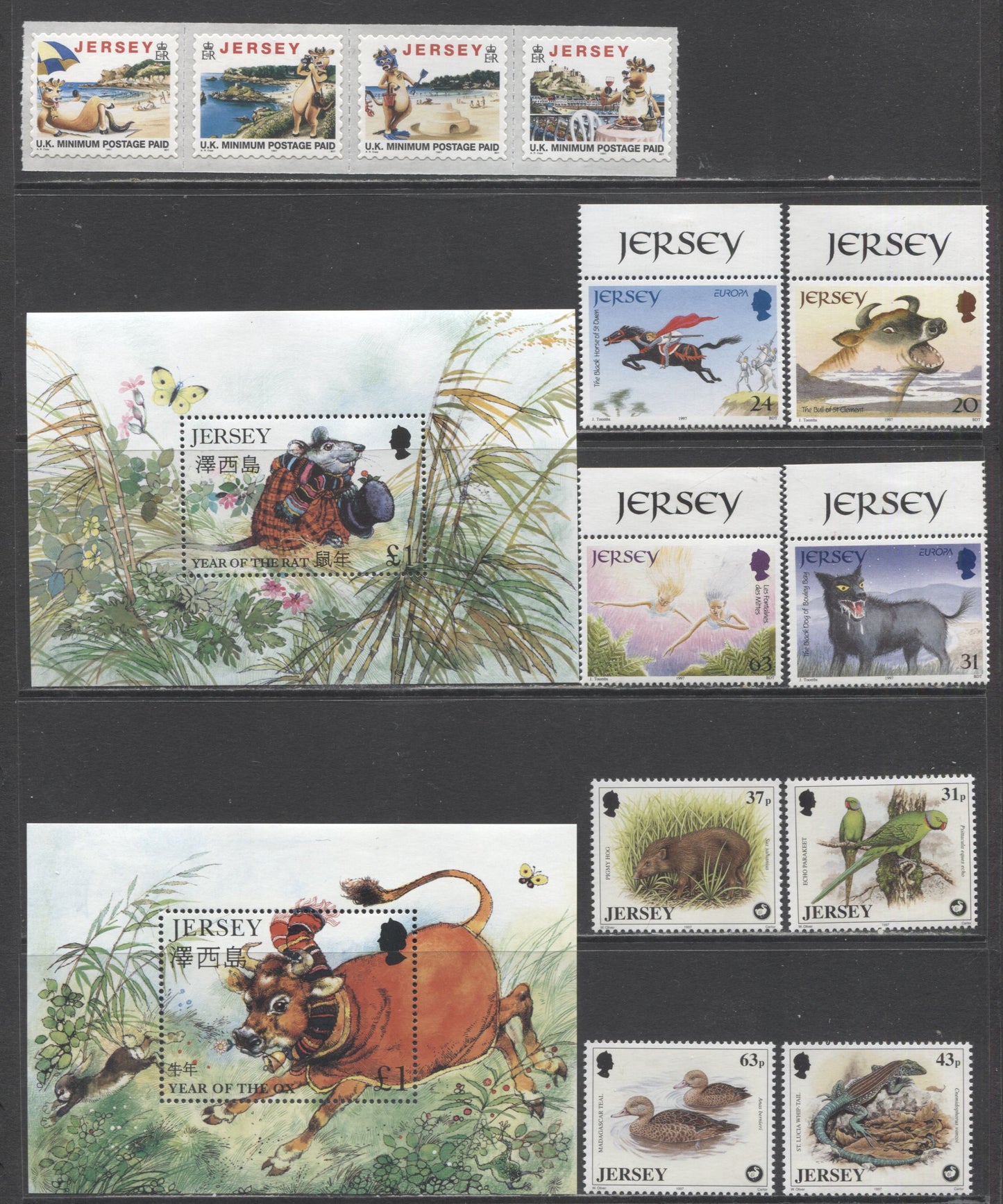 Lot 38 Great Britain - Jersey SC#746/811 1996-1997 Year Of The Rat, Ox, Lillie The Cow, Stories/Legneds & Wildlife Preservation Issues, 13 VFNH/OG Singles, Strip Of 4 & Souvenir Sheet, 2017 Scott Cat. $20.25
