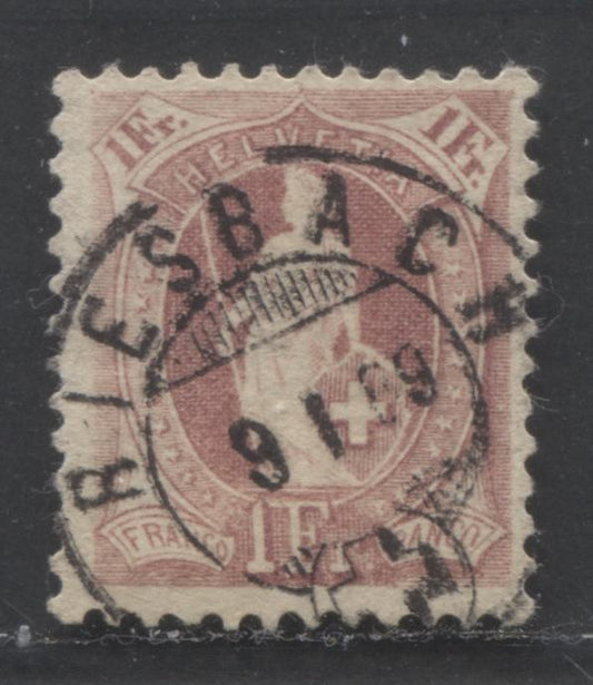 Lot 504 Switzerland SC#87 1Fr Claret 1882-1904 Standing Helvetia Issue, Wmk Cross in Oval Type I, Perf. 11.5-11.75, SON January 9, 1889 Riesbach CDS Cancel, A Fine Used Single, Click on Listing to See ALL Pictures, Estimated Value $10