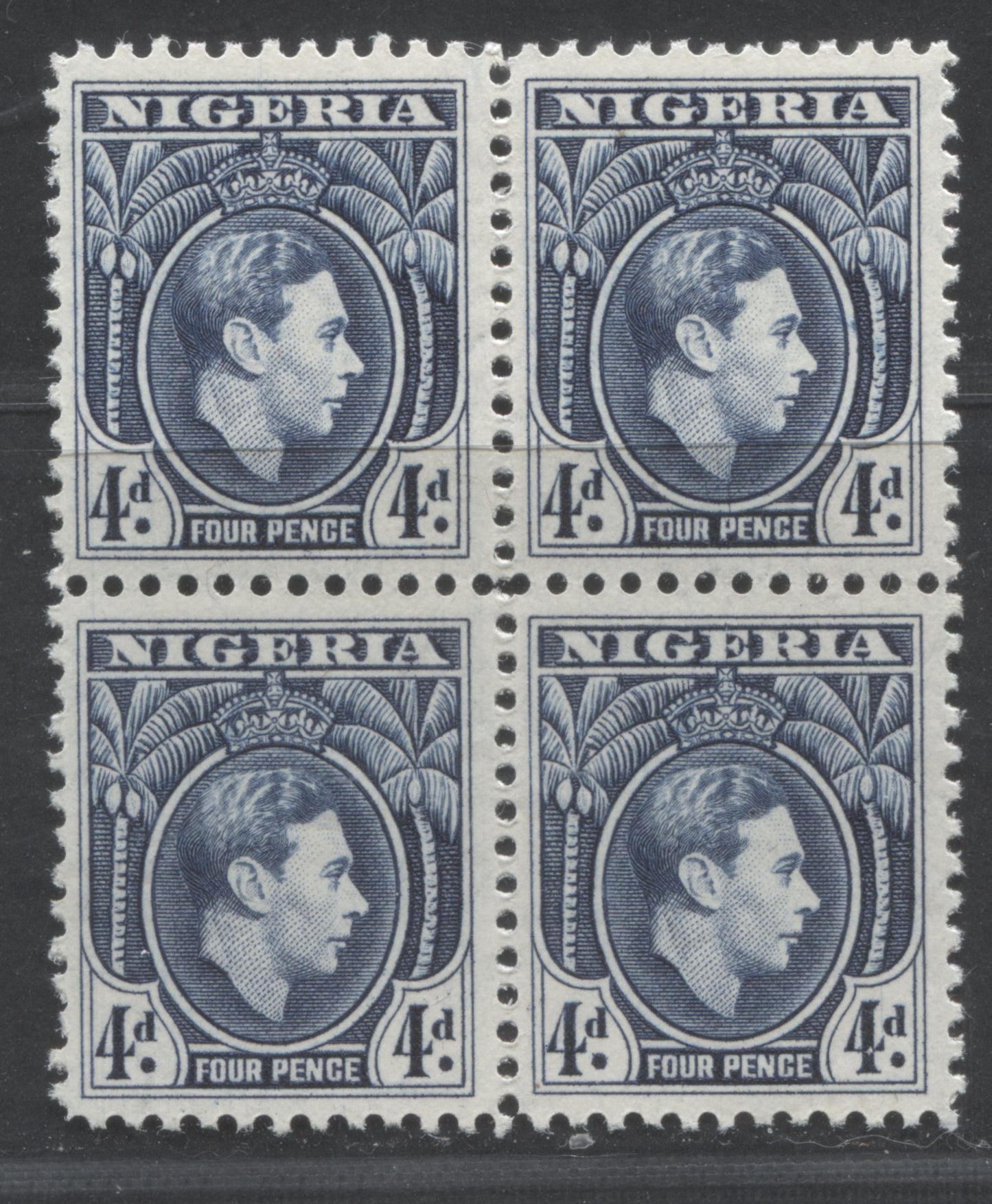 Lot 439 Nigeria #68var (SG#54avar) 4d Blue King George VI, 1938-1952 King George VI Definitive Issue, A VFNH Block of 4, Line Perf 12, 1945 Printing, Scratch Through Neck & Medallion & Between Right "4" & "D"