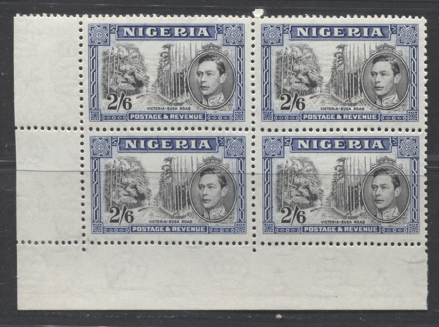 Lot 96 Nigeria #63c (SG#58) 2/6d Black & Ultramarine King George VI & Buea Road, 1938-1952 King George VI Definitive Issue, A VFNH/OG LL Corner Block, Comb Perf. 13 x 11.5, 1938 Printing, Bird Near Tree Variety