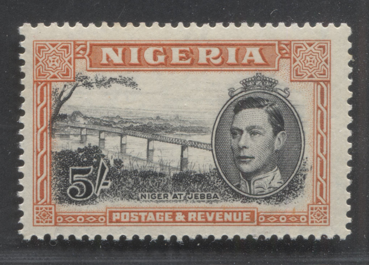 Lot 505 Nigeria #64var (SG#59avar) 5/- Intense Black & Dull Red Orange King George VI & Niger Bridge, 1938-1952 King George VI Definitive Issue, A Fine NH Single, Comb Perf. 13.5, 1946-1947 Printing, Vertical Dash To Right of Foliage At LR