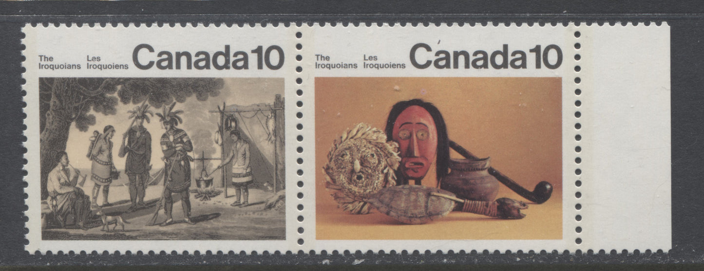 Lot 478 Canada #579avar 10c Multicoloured Encampment & Artifacts, 1976 Iroquois Indians Issue, A VFNH Pair Pink Blemish Above Mask, Pos. 15, Possibly Tertiary, DF1/DF Paper