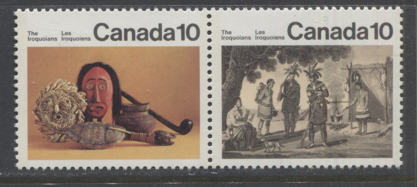 Lot 481 Canada #579avar 10c Multicoloured Encampment & Artifacts, 1976 Iroquois Indians Issue, A VFNH Pair Red Dot Above Pipe, Pos. 31, Possibly Tertiary, DF1/DF2 Paper