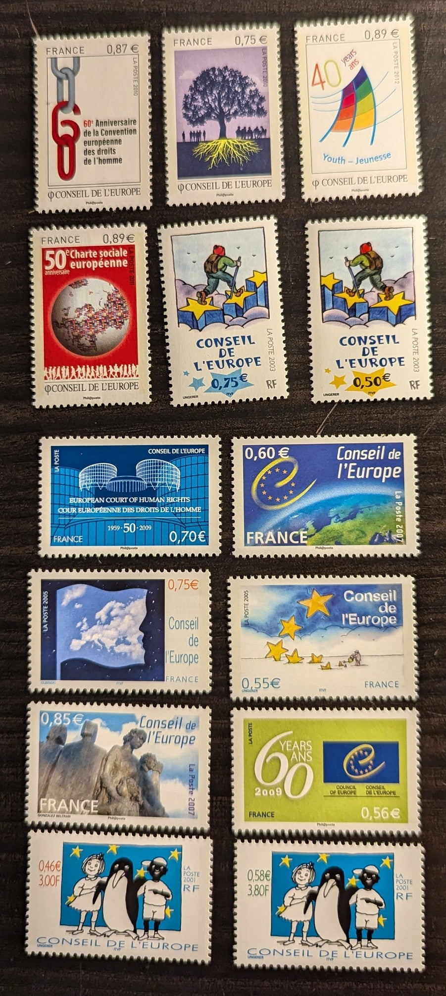 Lot 93 France - Council Of Europe SC#1O57-1O70 2001-2012 Girl, Boy & Penguin - European Youth Center, 14 VFNH Singles, Click on Listing to See ALL Pictures, 2017 Scott Cat. $31.8