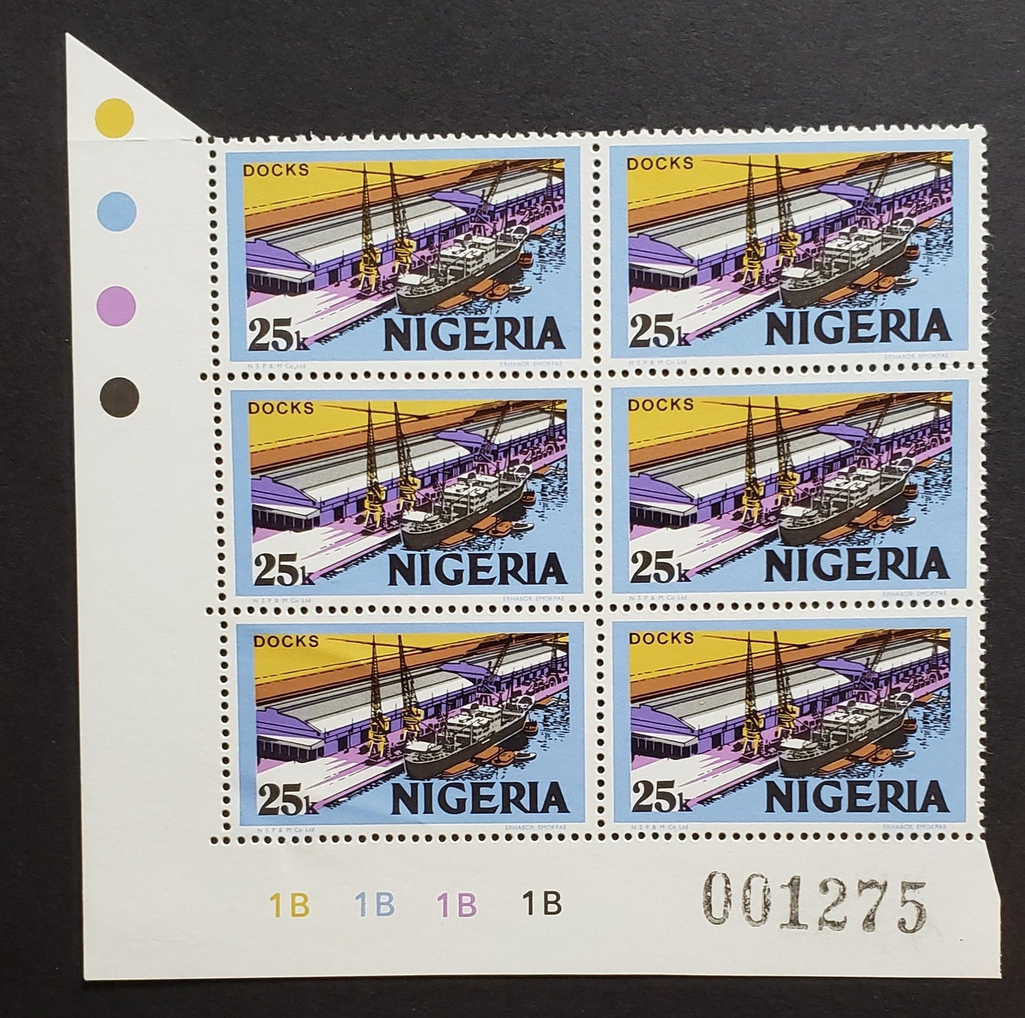 Lot 481 Nigeria #302 25k Multicoloured Docks, 1973-1974 Nigerian Life & Industry Definitive Issue - Unwatermarked & Lithographed, A VFNH Lower Left Cylinder 1B block of 6 HF/MF Paper, Shiny Gum Arabic, Black Is The Top Colour