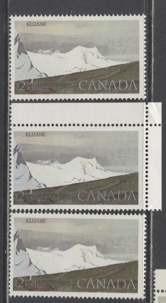 Lot 504 Canada #727ivar $2 Kluane National Park, 3 Fine & VFNH Singles On DF1/DF1 Paper, Very Light Violet Glow Under UV On The Face, & DF2/DF1 Paper, Silver Inscriptions Shifted Up 3/4mm, 3/4mm From Bottom Frame, Here They Are 1.5mm From It