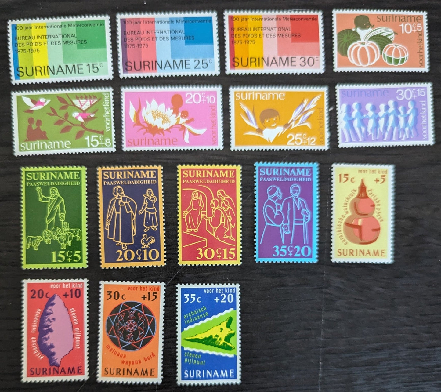 Lot 132 Surinam SC#421/B225 1974-1975 Symbolic Designs - Child Welfare Issues, 16 VFNH/OG Singles, Click on Listing to See ALL Pictures, 2017 Scott Cat. $8.7