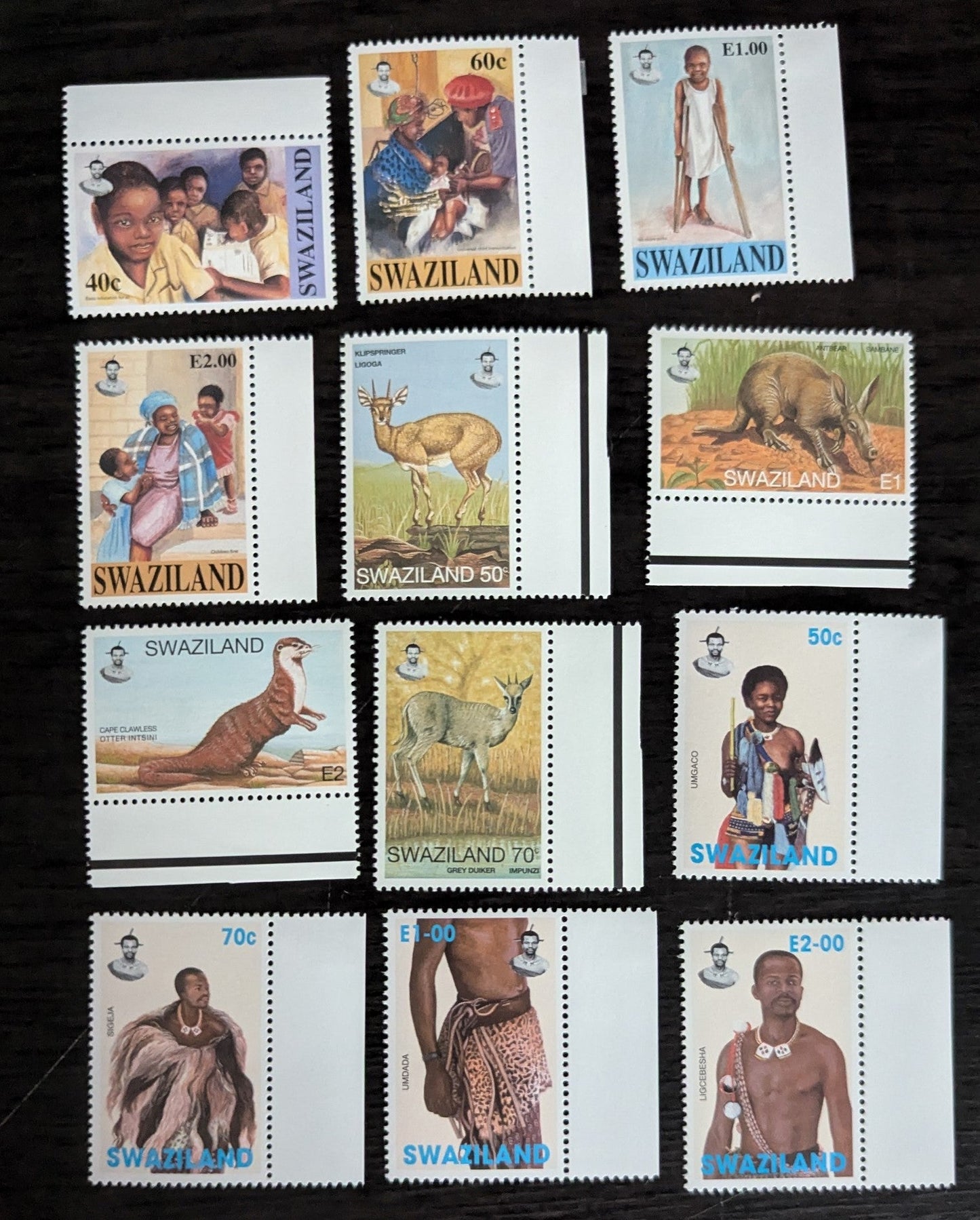 Lot 216 Swaziland SC#664-675 1996-1997 UNICEF, 50th Anniv - Traditional Costumes Issues, 12 VFNH Singles, Click on Listing to See ALL Pictures, 2017 Scott Cat. $10.4