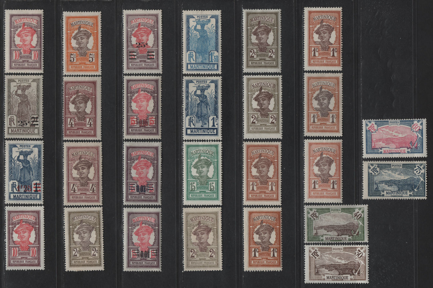 Lot 176 Martinique SC#62-64, 66, 69, 71, 79, 82, 87, 90, 94, 97, 108-110, 120-121, 124 1c - 1.25fr on 1fr Red Brown & Brown - Dark Blue Martinique Woman - View of Fort-de-France, 1908-1930 Pictorial Definitives & Surcharged Issues, 27 F/VFOG Singles,