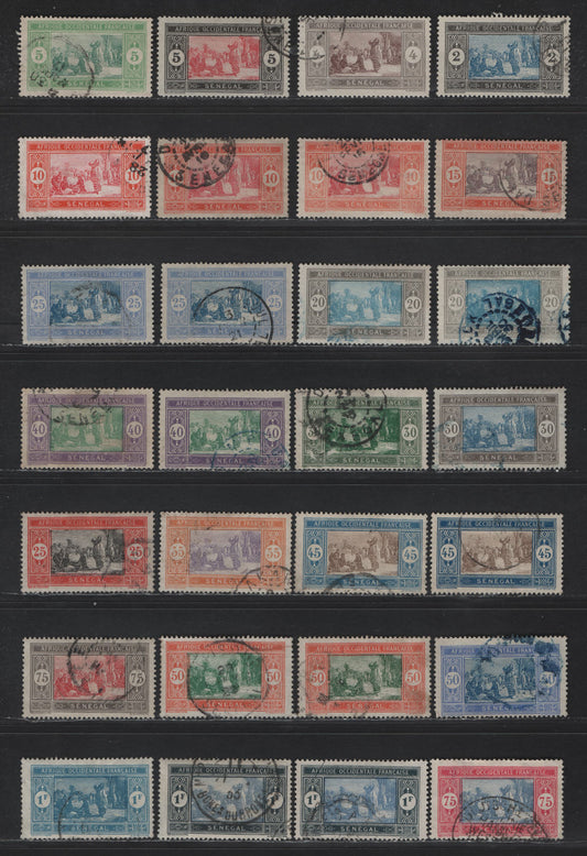 Lot 112 Senegal SC#80-84a, 87, 90-92, 95, 97-99, 104-105, 108, 110, 113-114 2c - 1fr Black & Blue - Black & Gray Blue Senegalese Preparing Food, 1914-1927 Keyplate Issue, 28 Fine/Very Fine Used Singles, Includes Listed Shades