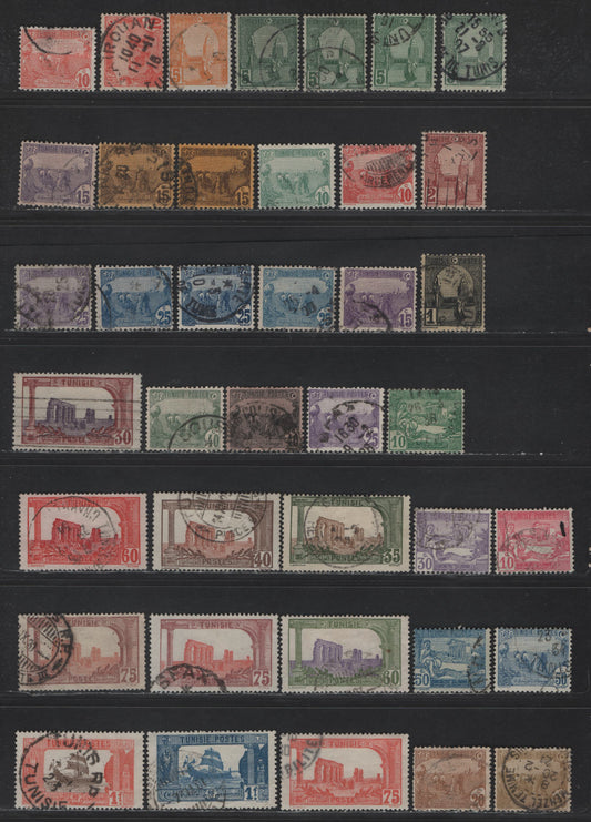 Lot 145 Tunisia SC#29-30, 32-41, 43-53, 65-69 1c - 1fr Black on Yellow - Indigo & Ultramarine Mosque at Kairouan - Arab & Ruins of Dougga, 1906-1926 Keyplate Definitive Issue, 39 Fine/Very Fine Used Singles