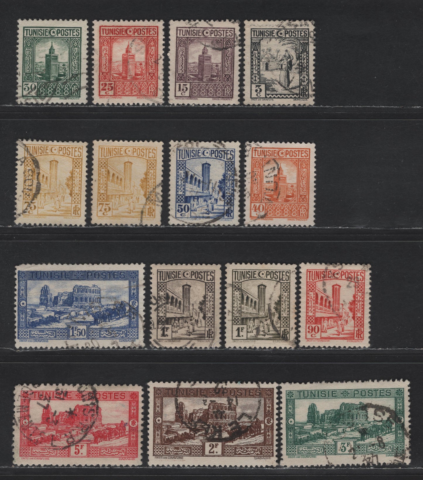 Lot 150 Tunisia SC#124, 127, 129-140 3c - 5fr Black - Carmine Rose Arab Woman Carrying Water - Roman Amphitheater, 1931-1934 Pictorial Issue, 15 VFOG Singles, Plus Additional Shades