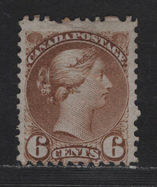 Lot 325 Canada  #39 6c Yellow Brown Queen Victoria, 1870-1897 Small Queen Issue, A Good Unused Single Early Montreal Printing On Paper EM-C, Perf. 12, Closed Tear At Top
