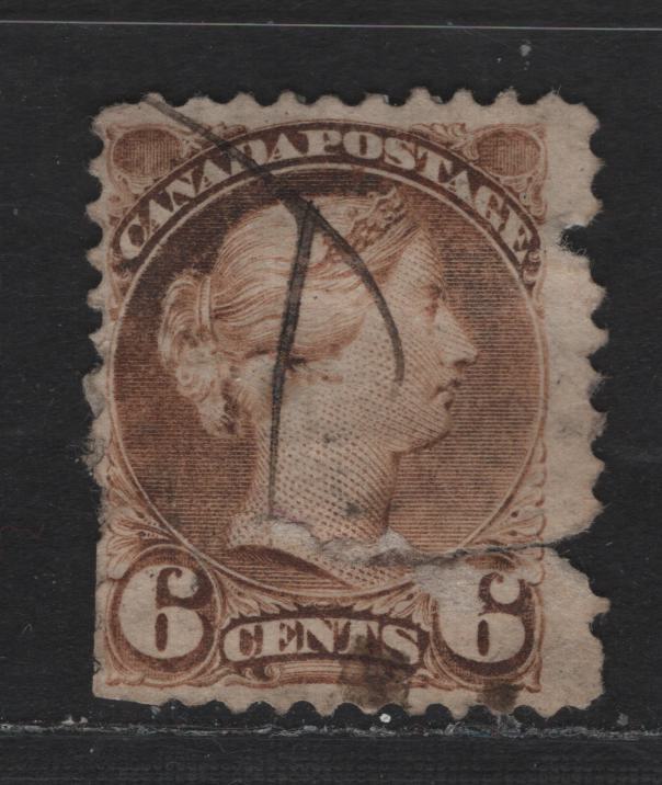 Lot 327 Canada  #39vvar 6c Brown Queen Victoria, 1870-1897 Small Queen Issue, A Ungraded Used Single Terrible Example Of The Rare Perf. 11.6 x 11.75, Very Fauty, But The First I Have Seen