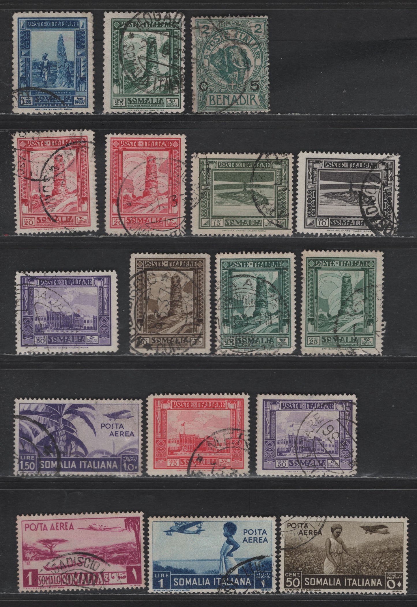 Lot 282 Italy - Somalia SC#11, 143, 148, 140a-144a, 146a, 147a, C22, C8, C11-C12 5c on 2b - 1l Blue Green - Rose Lilac Surcharges - Airmails, 1906-1941 Surcharged - Airmail Issues, 14 Fine/Very Fine Used Singles