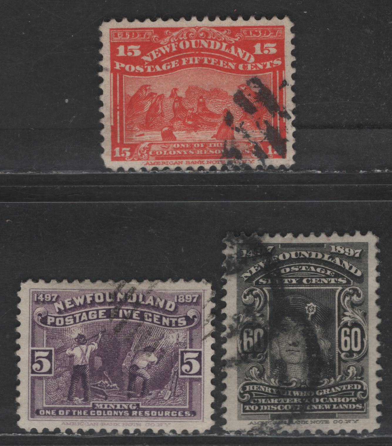 Lot 32 Newfoundland #65, 70, 74 5c - 60c Violet - Black Mining - King Henry VII, 1897 Discovery of Newfounfland Issue, 3 Fine/Very Fine Used Singles