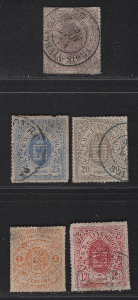 Lot 192 Luxembourg SC#18, 19a, 20, 21, 22A 1c - 25c Orange - Ultramarine Coat of Arms, 1865-1874 Coat of Arms Rouletted Issue, 5 Very Good/Fine/Very Fine Used & Unused Singles, Rouletted In Color, Most With Moderate to Shallow Thins, 1c Is Unused.