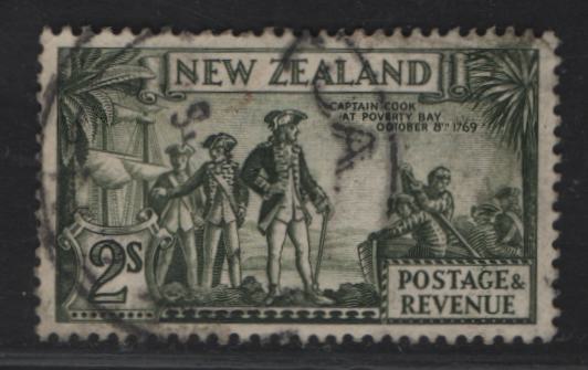 Lot 91 New Zealand SG#568 2/- Olive Green Capt Cook At Poverty Bay, 1935-1936 Pictorial Issue, A Very Fine Used Single, Perf 13-14x13.5, Single Star & NZ Wmk