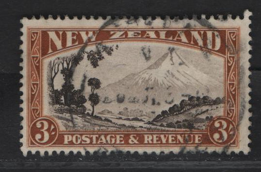 Lot 94 New Zealand SG#569 3/- Chocolate & Yellow Brown Mt. Egmont, 1935-1936 Pictorial Issue, A Very Good Used Single, Perf 13-14x13.5, Internal Wrinkle At 'Nu' of 'Revenue, Single Wmk.