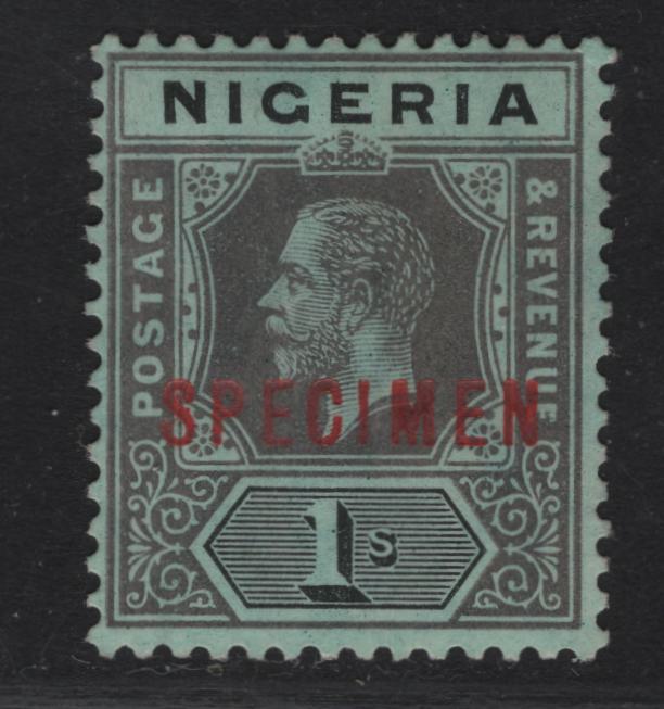 Lot 116 Nigeria SG#8s 1/- DeepGray & Black King George V, 1914-1929 KGV Imperium Keyplate Issue, Wmk Multiple Crown CA, A Fine Unused Single, Blue Green Paper With White Back, Specimen Overprint, Scarce, With Less Only 400 Issued.