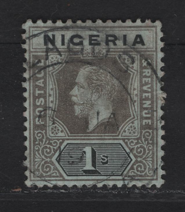 Lot 124 Nigeria SG#8d 1/- Pale Brownish Gray & Black King George V, 1914-1929 KGV Imperium Keyplate Issue, Wmk Multiple Crown CA, A Very Fine Used Single, Pale Bluish Green Paper With Pale Olive Back