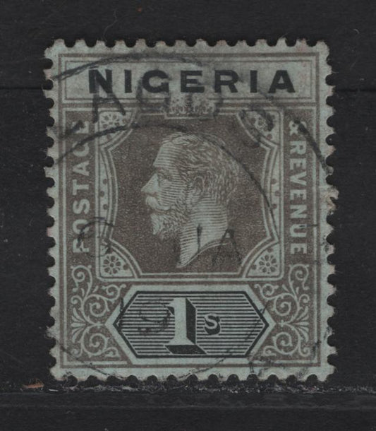 Lot 124 Nigeria SG#8d 1/- Pale Brownish Gray & Black King George V, 1914-1929 KGV Imperium Keyplate Issue, Wmk Multiple Crown CA, A Very Fine Used Single, Pale Bluish Green Paper With Pale Olive Back