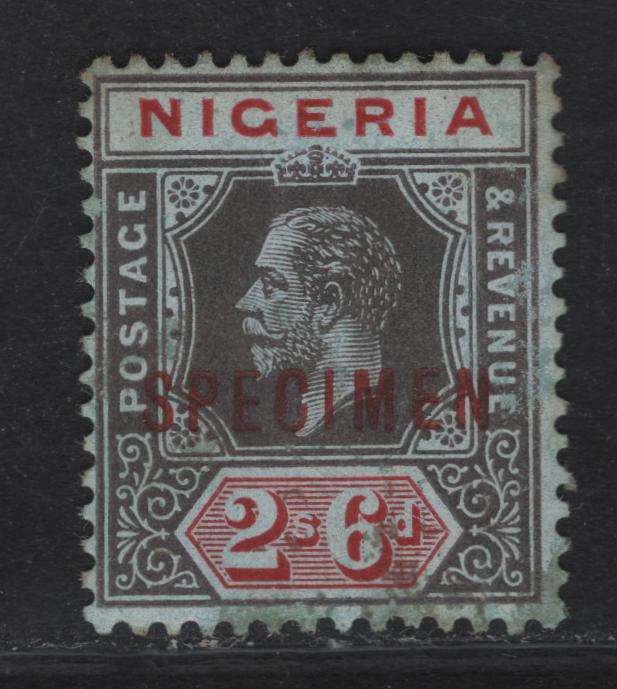 Lot 133 Nigeria SG#9s 2/6 Gray Black & Deep Red  King George V, 1914-1929 KGV Imperium Keyplate Issue, Wmk Multiple Crown CA, A Very Good Unused Single, Pale Blue Paper With Blue Back, Red Specimen Overprint, Scarce, With Less Only 400 Issued.