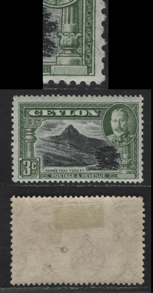 Lot 100 Ceylon SG#369var 3c Black & Olive Green Adam's Peak, 1935-1936 Pictorial Issue, A FOG Single, Perf 13x12, Large Vertical Scratch To The Left Of The Right Pillar, Unlisted & Scarce.