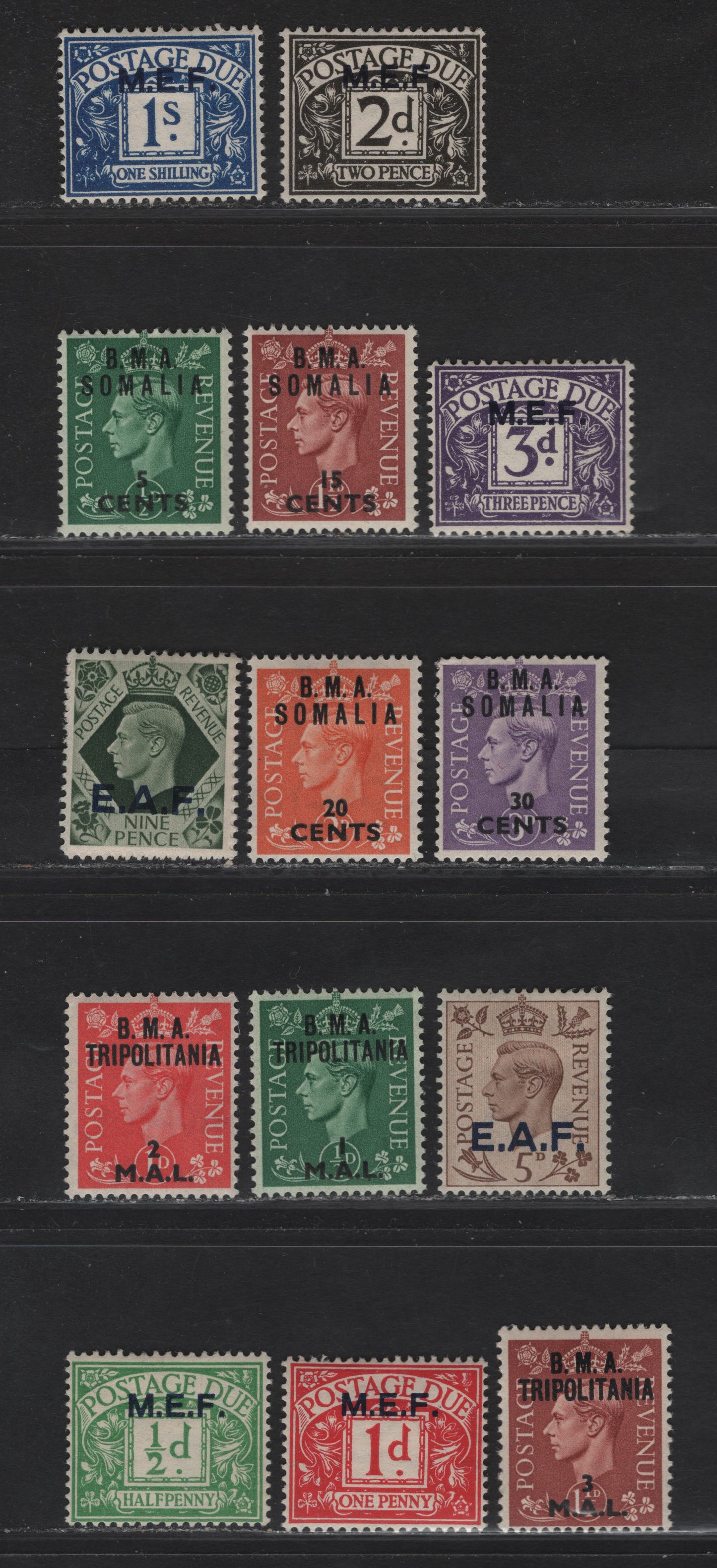 Lot 401 British Occupation of Italian Colonies SG#MD1-MD5, S10-S12, S14, T1-3, S2, S5, S7 1/2d - 1.5d Emerald - Red Brown King George VI - Numerals, 1942-1950 Overprinted Issue, 14 F/VFOG Singles