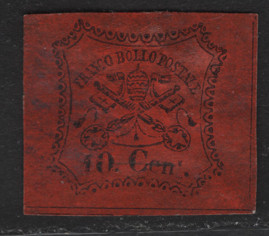 Lot 30 Roman States SC#15 10c Black on Vermillion Papal Arms, 1867 Arms Issue, A Very Fine Used Single, Glazed Paper, Dividing Lines on 3 Sides, T of Cent Almost Missing, Horizontal Lines At Base Are Continuous.