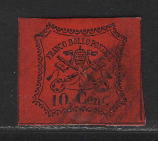 Lot 32 Roman States SC#15 10c Black on Vermillion Papal Arms, 1867 Arms Issue, A Very Fine Used Single, Glazed Paper, Traces of Dividing Lines Visible On All Sides, Clear Evidence That The Horiz Lines Are Continuous.