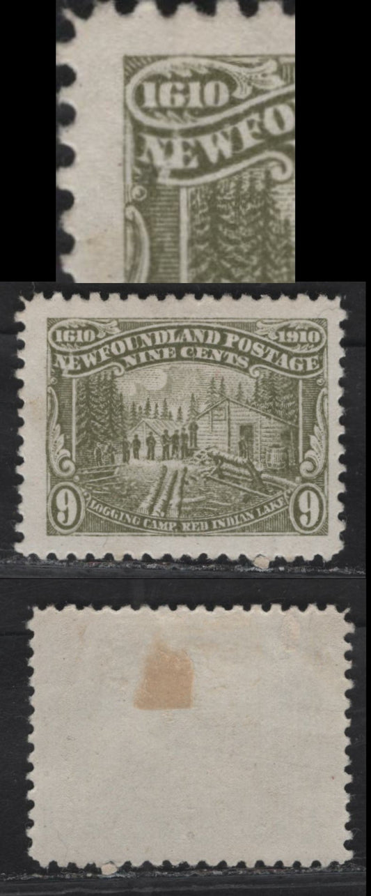 Lot 76 (C) Newfoundland #94 9c Olive Green Logging Camp, 1910 John Guy Issue, A FOG Single, Paper WM-A, Perf 11.8, Showing Unlisted Blob Under N of (C) Newfoundland And Damage Between NE of (C) Newfoundland.