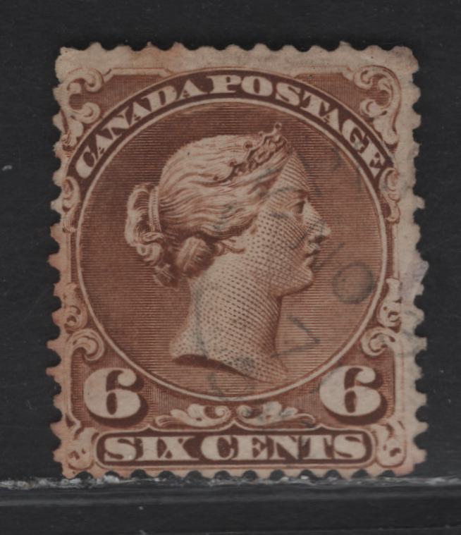 Lot 27 (C) Canada #27a 6c Yellow Brown Queen Victoria, 1868-1876 Large Queen Issue, A Very Good Used Single, Paper FO-D (Silky Smooth Opaque Wove), Perf 12.1x12, Plate 1 Example With Guide Dot Below The LL Scroll.