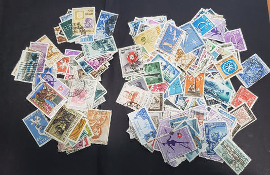 Lot 308 Italy 1956-1969 Commemorative Issues, 600-800 F-VF Used Singles In Three Large Glassine Envelopes, Unchecked For  Paper Fluorescence & Tagging Varieties, Ideal For Further Study